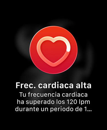 Notificación de frecuencia cardiaca alta, silueta blanca de un icono de corazón sobre un círculo rojo