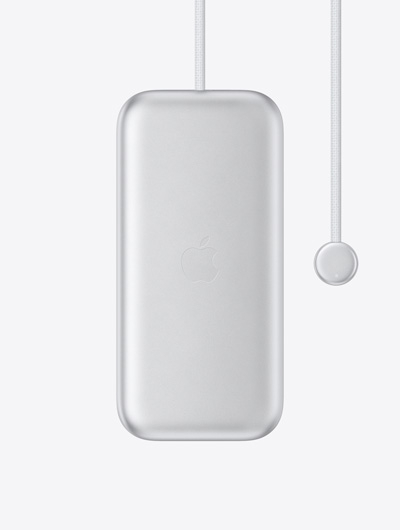 Apple Vision Pro Batterie Gehäuse mit Apple Logo in der Mitte, integriertem Netzkabel mit rundem Anschluss an einem Ende, LED Anzeige am Anschluss
