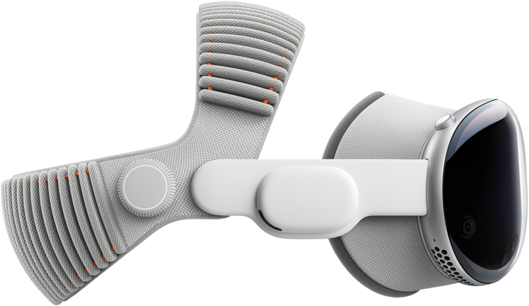 Apple Vision Pro 的側面圖，展示鋁框，裝有遮光罩、音訊連接帶和雙圈編織頭帶