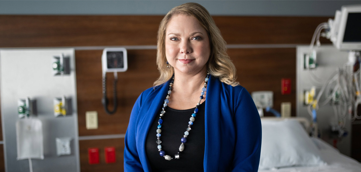 A provider in a hospital room.