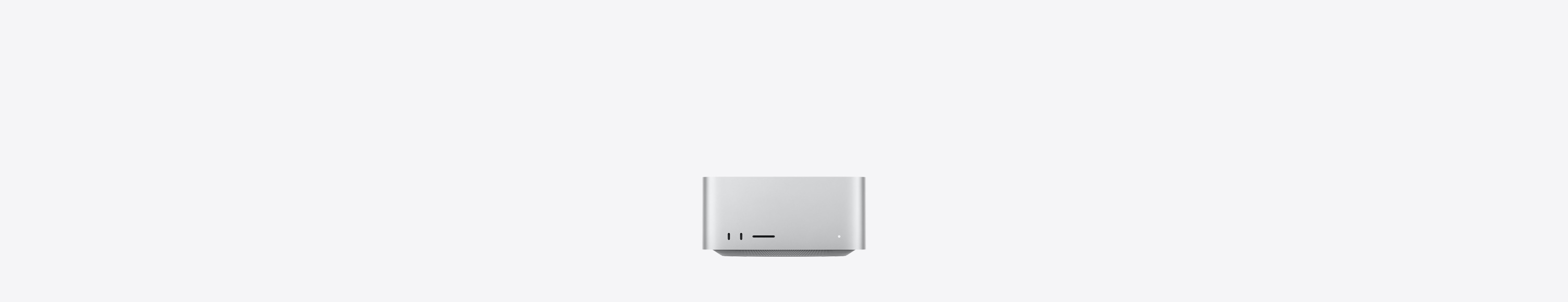 Mac Studio’nun önden görünümü, iki adet USB-C bağlantı noktası, SDXC kart yuvası, durum göstergesi ışığı, altta konik tasarımlı taban, düz üst yüzey, yuvarlatılmış köşeler, düz kenarlar, gümüş rengi