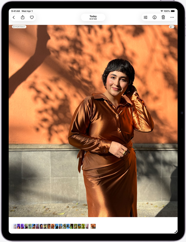 Front exterior of 13-inch iPad Air displaying the Photos app, showcasing the Liquid Retina display