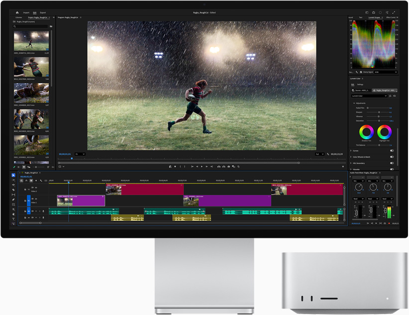 Studio Display XDR, das Display zeigt Adobe Premiere und das Bild einer Person beim Laufen im Regen auf einem Sportplatz, Mac Studio, Vorderansicht