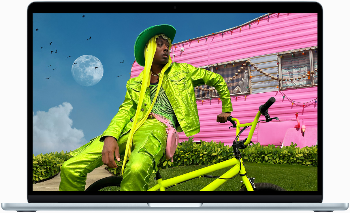 MacBook Air screen showing photo of person in colorful outfit, demonstrating color range and resolution of Liquid Retina display