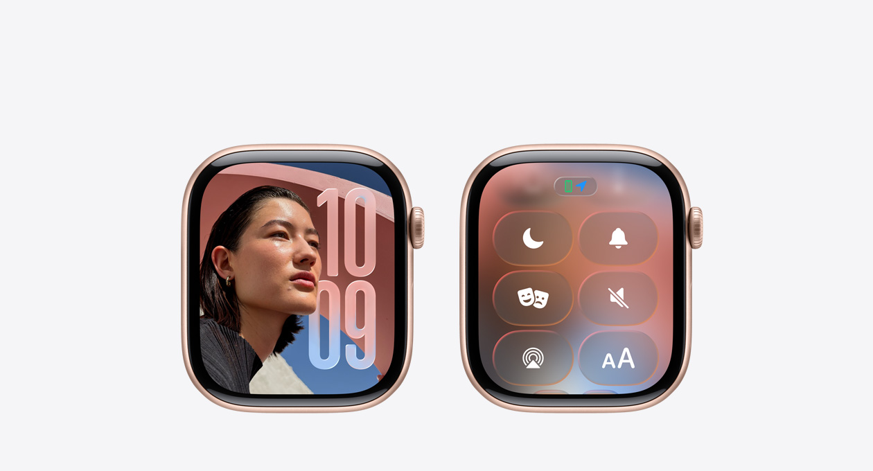 Apple Watch em rosa‑dourado sem bracelete, o mostrador com a app Relógio apresenta o novo design Liquid Glass do watchOS 26